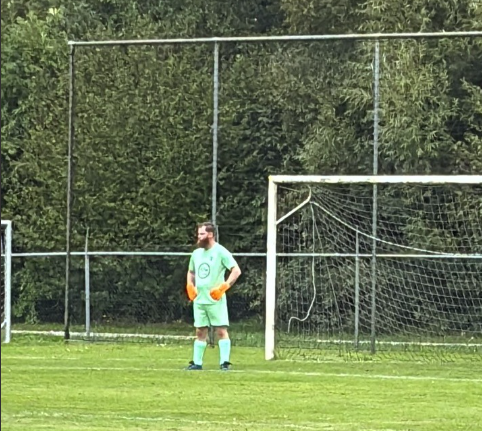 Peize Zat-keeper in het groen tijdens de bekergroepsfase